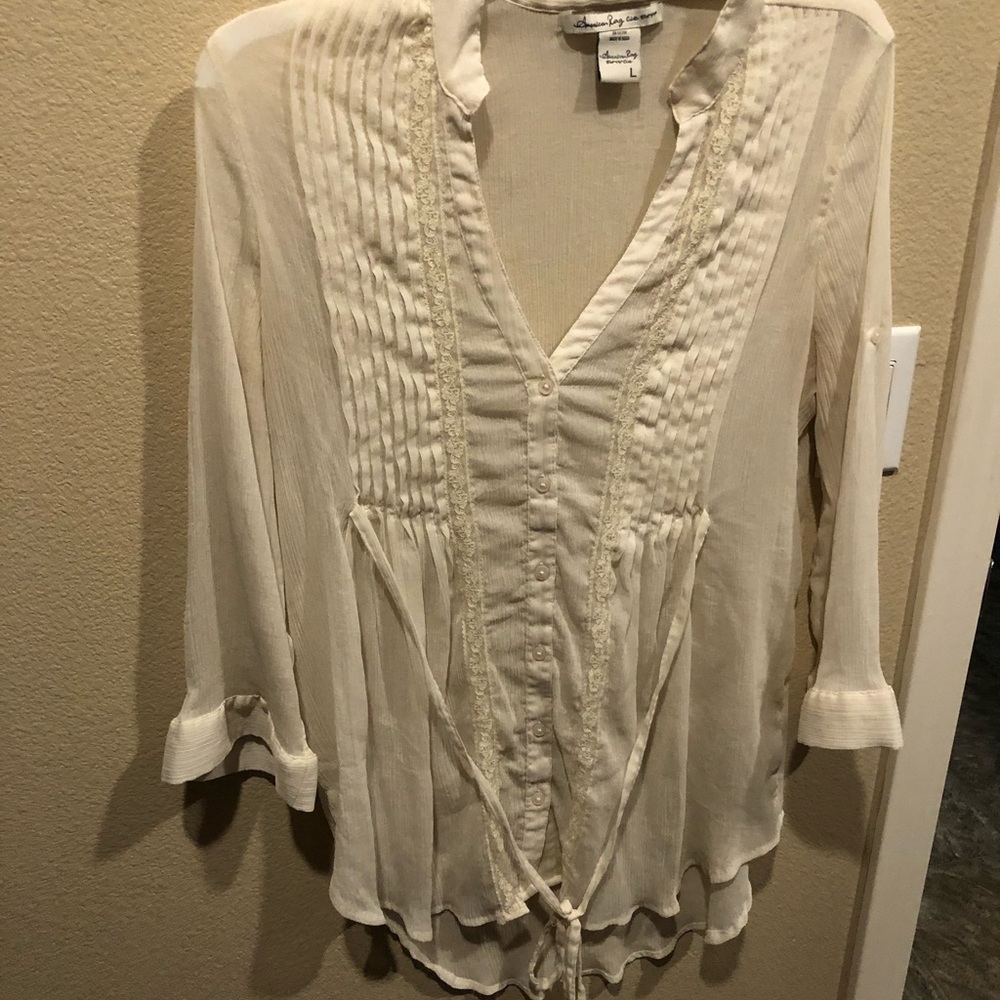 Sheer high low top